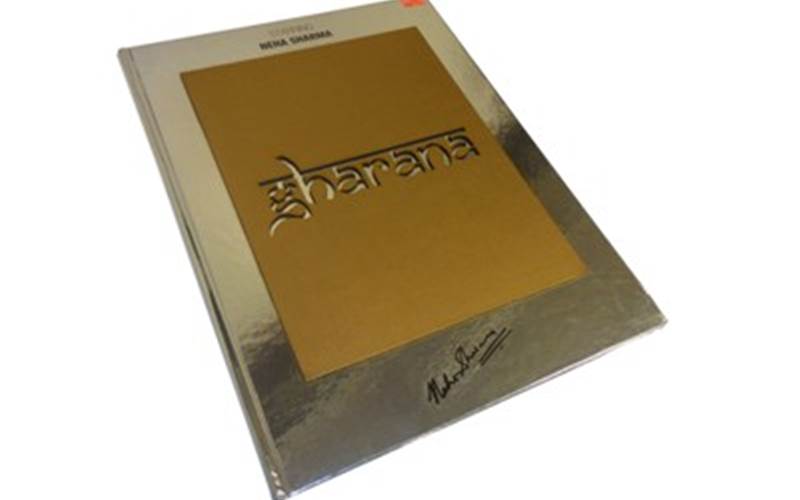 ALMATS BRANDING SOLUTIONS| Gharana fashion catalogueLength of run: 1000Art: CMYKPre-Press: GMG SolutionsPress: Heidelberg SORDZ (25x36) and Ryobi 920 (25x36)Post-Press: Aqueous coating on all pages and three inserts Paper: 170gsm sinar art paper for the cover, 130gsm Ensemble Pure White for the text pages and 120gsm Sun S142 paper for the frameSpecial feature: For the frame, sun paper was pasted on MDF board and laser cut and pasted on the cover. met-PET printing on cover