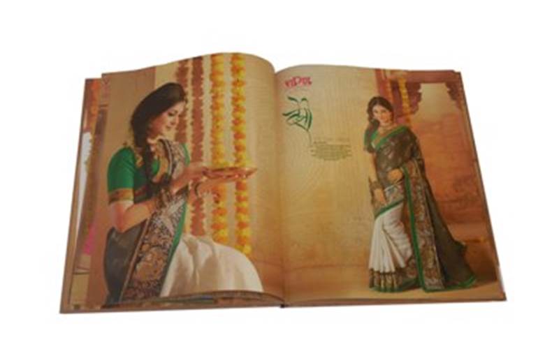 ALMATS BRANDING SOLUTIONS| Vipul Saundarya fashion catalogueLength of run: 800Art: CMYKPre-Press: GMG Solutions Press: Ryobi 920 (25x36) and Heidelberg SM74 (24x29)Post-Press: Foil stamping and aqueous coating on the two logos on the cover page, aqueous coating on all text pages, with hardcase bindingPaper: 160gsm Insize Modigliani Candido for the cover and 225gsm Leykam gloss art paper for the text pages