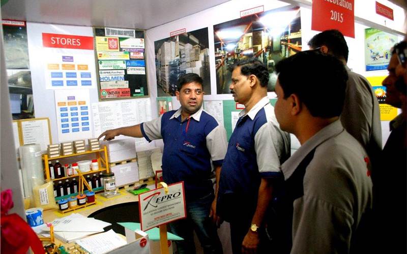 Stores official Pramod Shirke explains stores SOPs to his colleagues from sheetfed and binding divisions. Shirke informed: "We have 2000 tonne paper capacity and 150+ items in other raw materials (ORM) stores. The ORM stores is enhanced with 5S implementation"