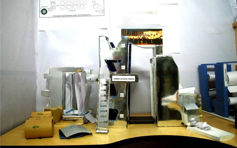 The stall of web offset division showcased paperboard dummies of stack press and Harris M1000 press