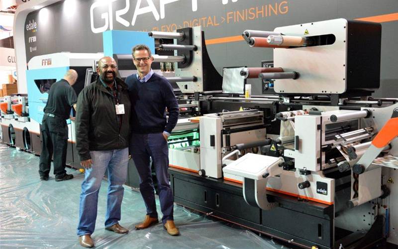 Amitabh Luthra of Printers Supply with Edale’s managing director James Boughton next to the Graphium Hybrid, a digital printing technology with flexo printing and finishing Edale has produced in collaboration with FFEI and Xaar.