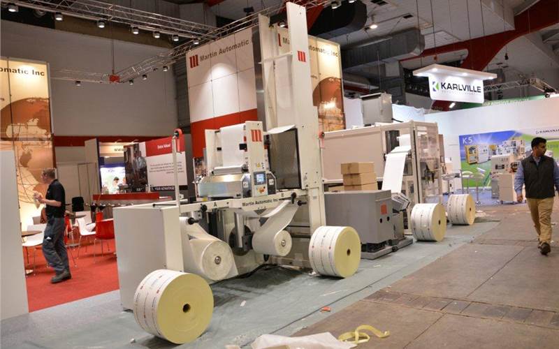Martin Automatic is showcasing the many benefits of non-stop roll change including time and resource savings with demonstrations of its popular MBS splicer and LRD rewinder. New features include an updated touch screen and the ability to run substrates from pressure sensitive label stock to flexible packaging