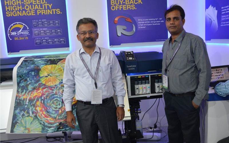 Epson’s upper northern region representative K Dogra (left), chief executive, Dynamik Business Systems said: Pick up any media of up to 1.0 mm thickness for application in the indoor and outdoor commercial printing, and these presses will deliver colours consistent across the media
