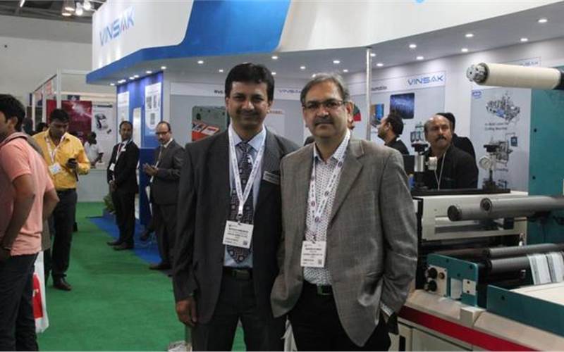 Mumbai-based label specialist, Mudrika Labels has invested in a Vinsak 330 slitter review with an EyeC inspection system. Vinsak's Pailwan with Mudrika's Desai at Labelexpo India 2016