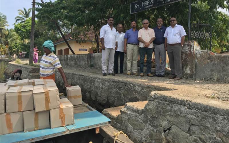 KMPA donates notebooks to flood-affected students